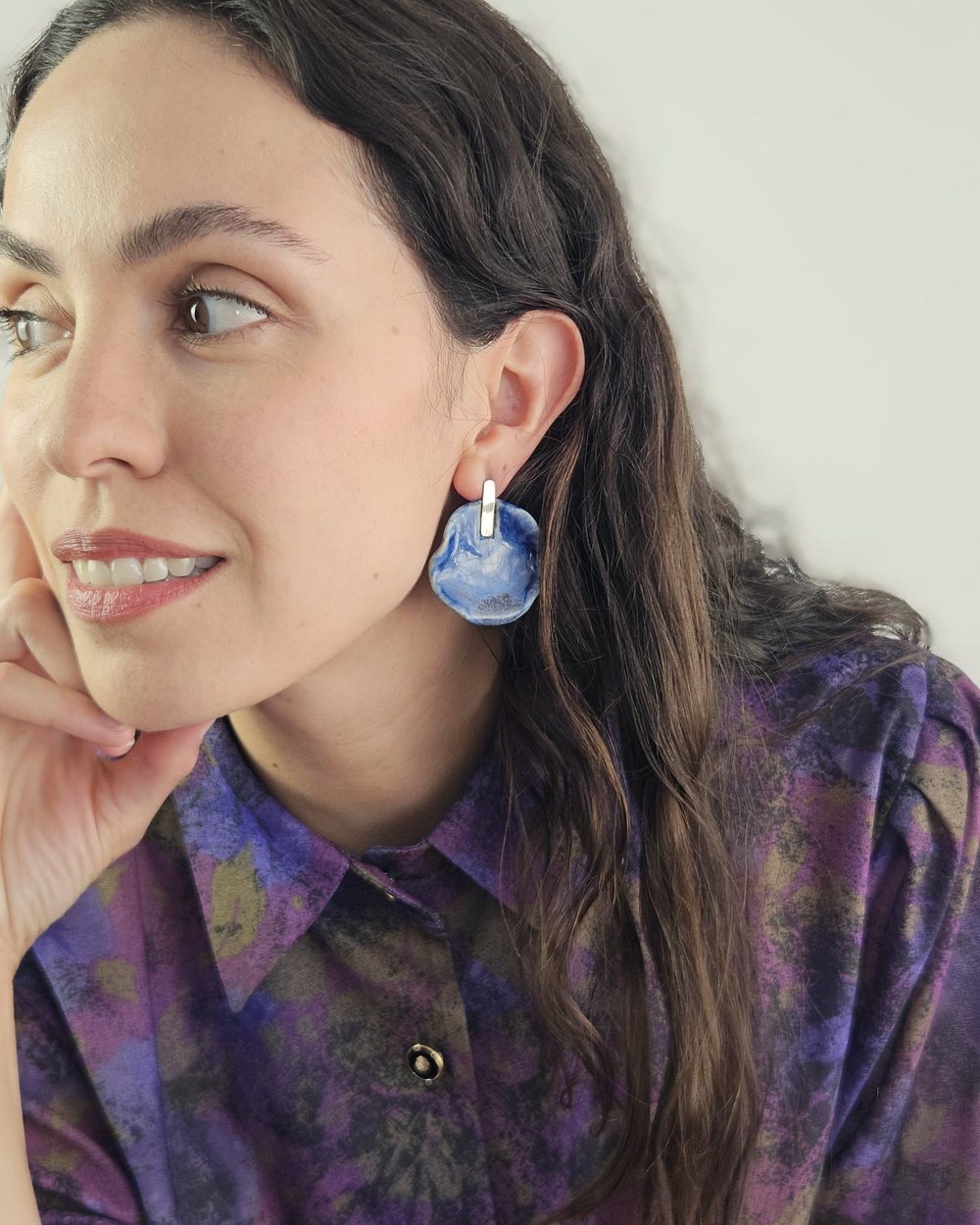 Ayerim Montilla wearing eme eme ceramic earrings
